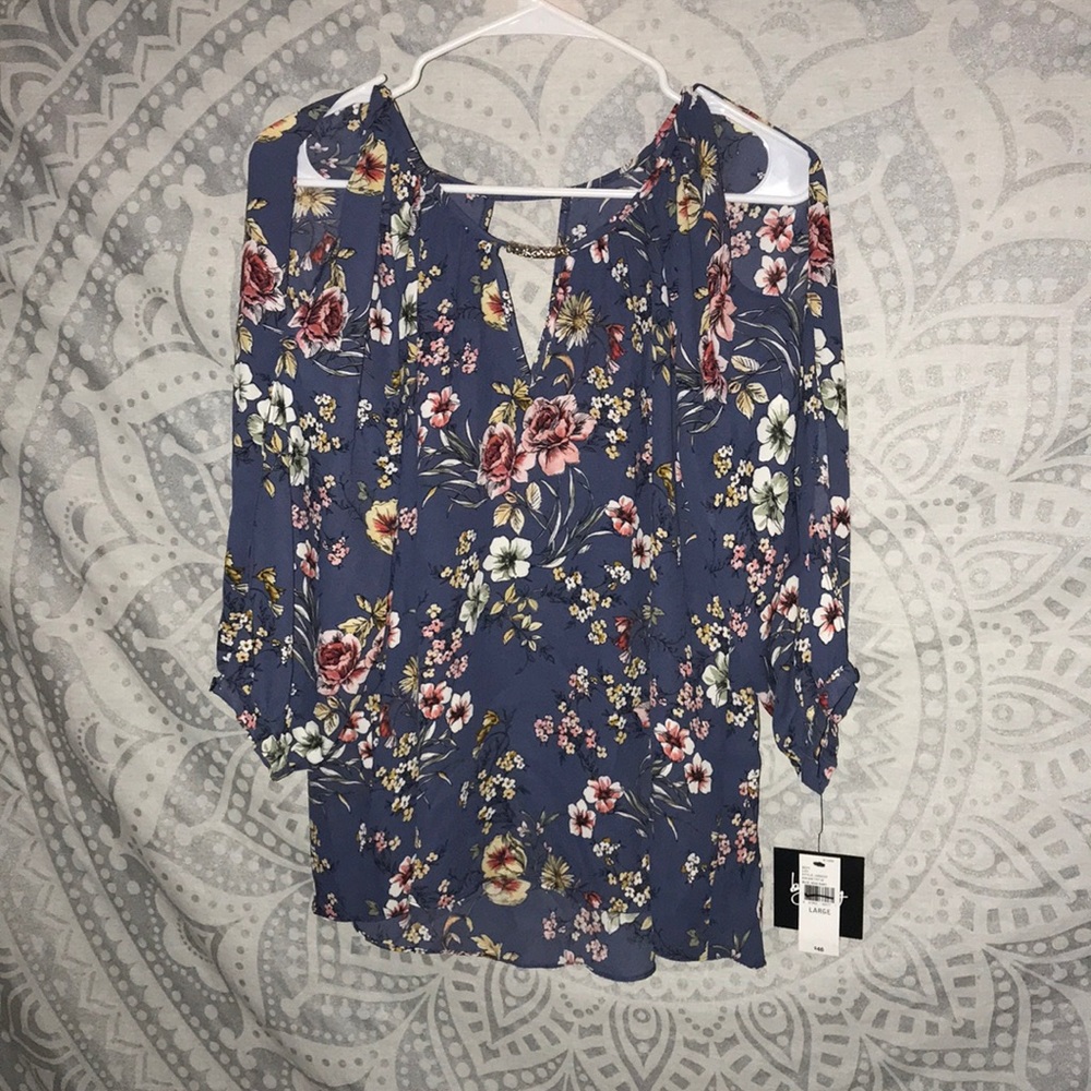 Blue blouse with flower design